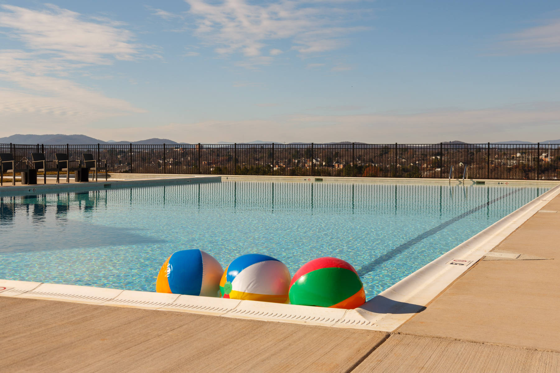 Cascadia swimming pool with beach balls.